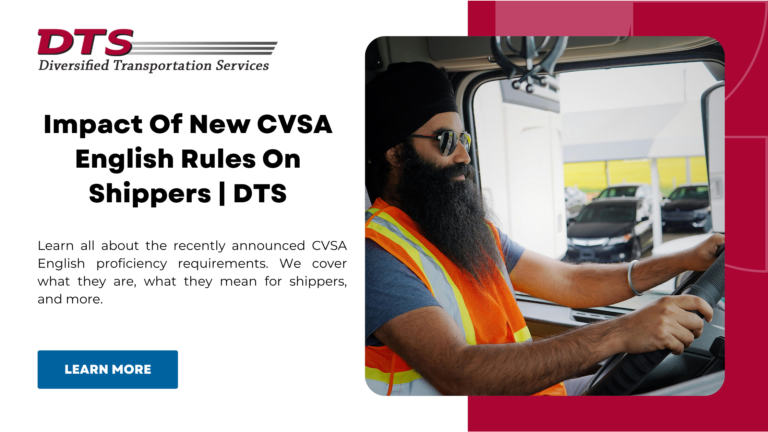 driver on a truck holding a steering wheel